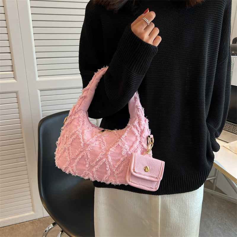 Ruby – Gesteppte Denim-Handtasche
