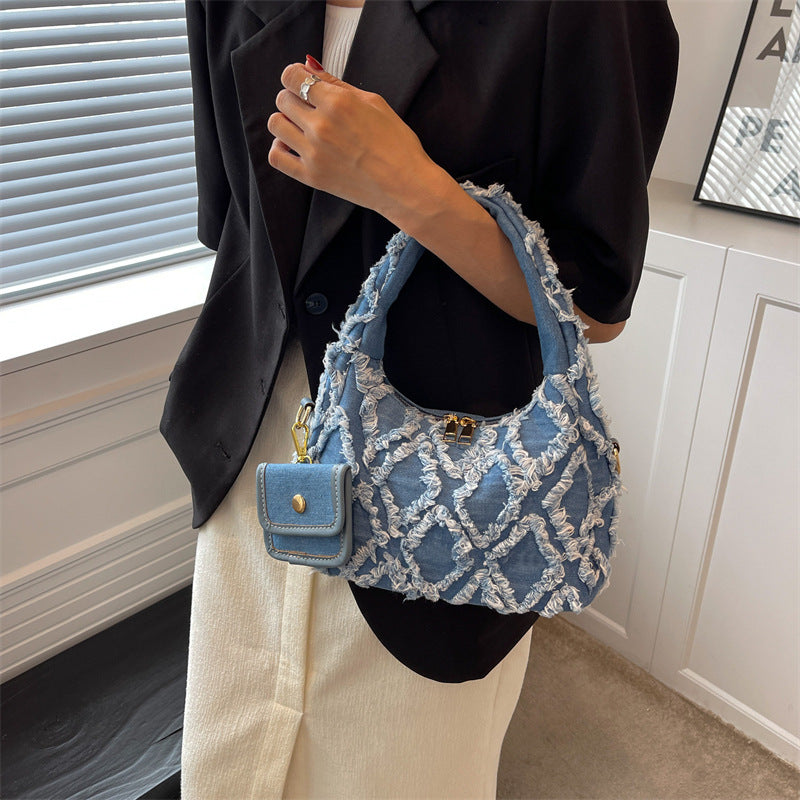 Ruby – Gesteppte Denim-Handtasche