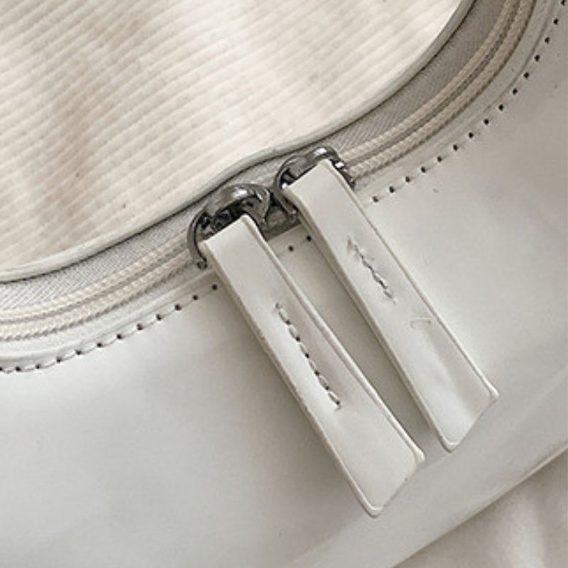 Sacs à bandoulière en cuir verni Scilla