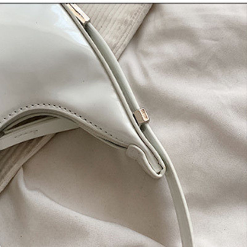 Sacs à bandoulière en cuir verni Scilla