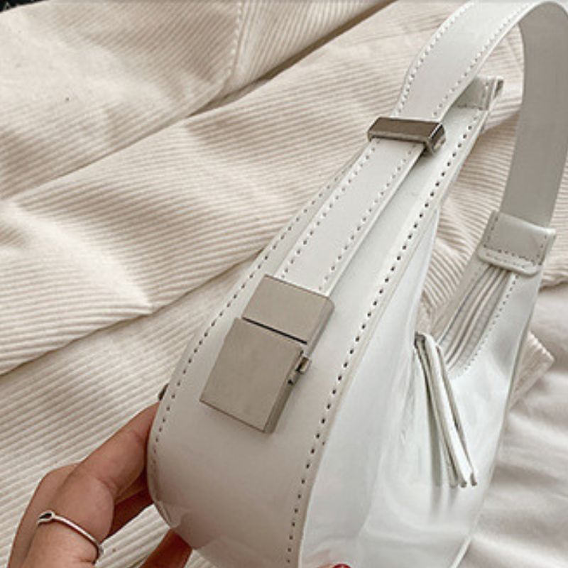 Sacs à bandoulière en cuir verni Scilla