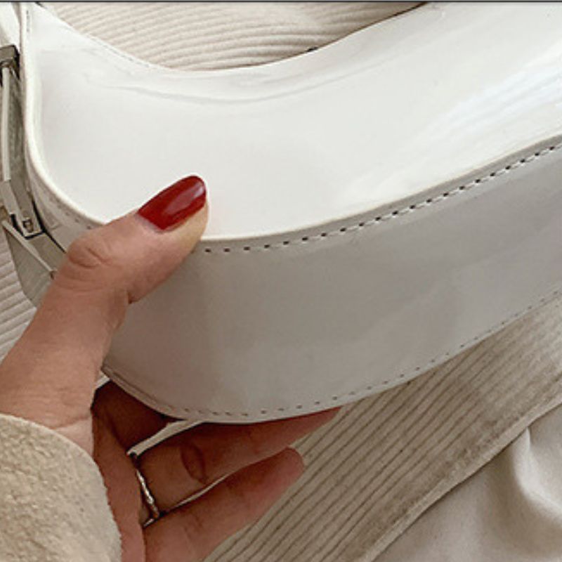 Sacs à bandoulière en cuir verni Scilla