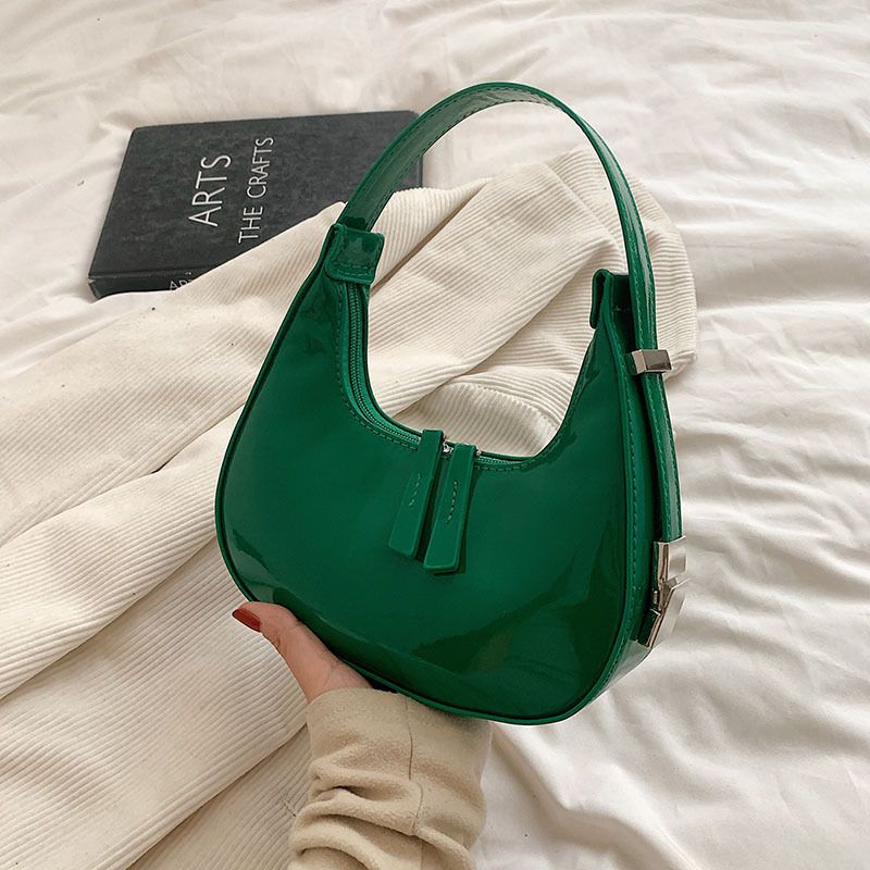Sacs à bandoulière en cuir verni Scilla