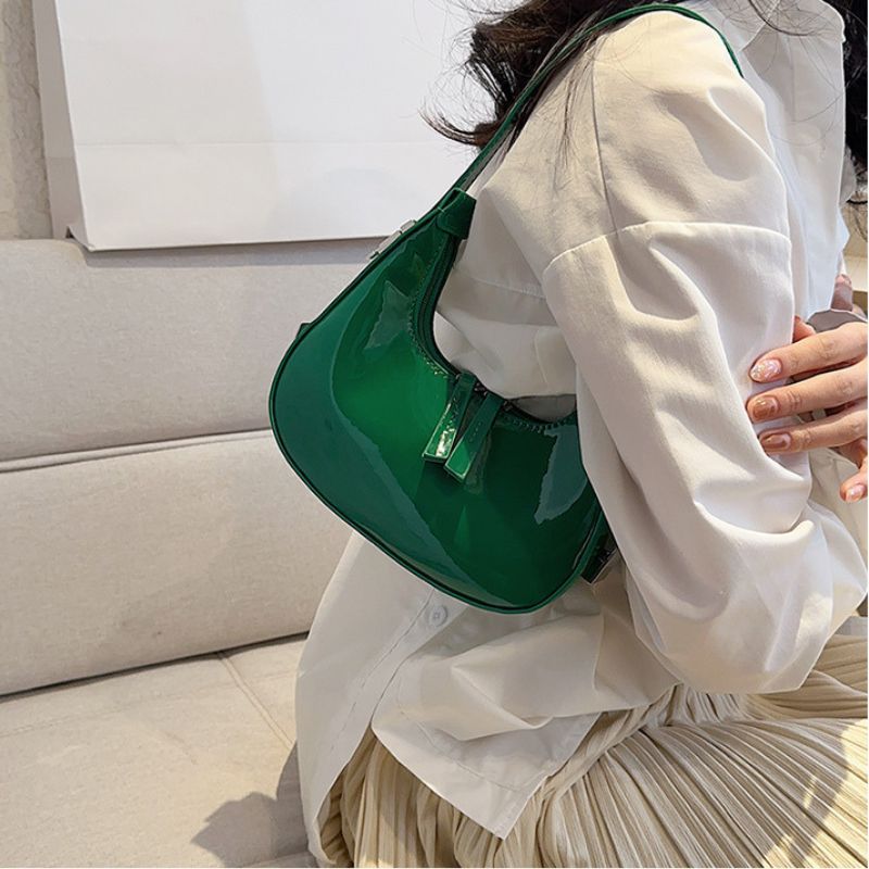 Sacs à bandoulière en cuir verni Scilla