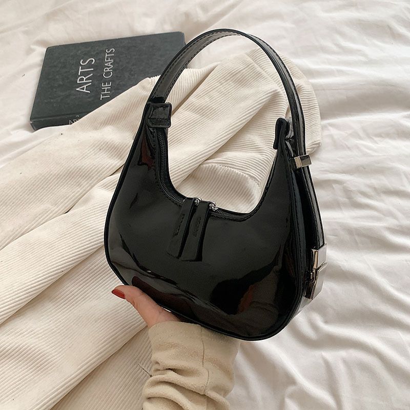 Sacs à bandoulière en cuir verni Scilla
