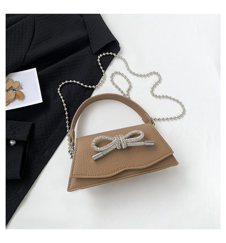 Mini sac à chaîne Aurora avec nœud en strass