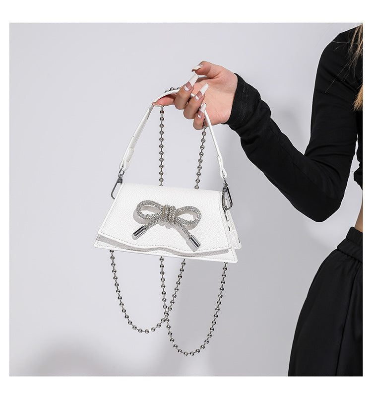 Mini sac à chaîne Aurora avec nœud en strass
