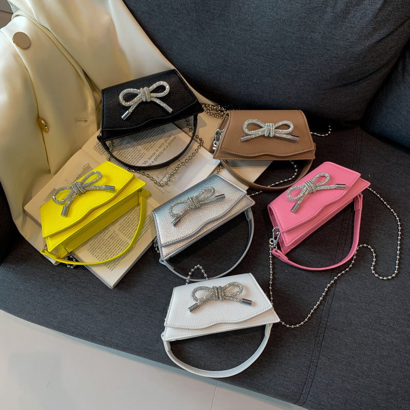 Mini sac à chaîne Aurora avec nœud en strass