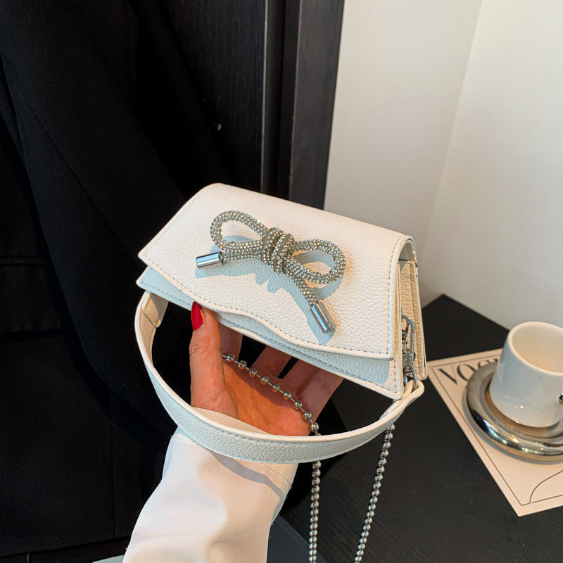 Mini sac à chaîne Aurora avec nœud en strass