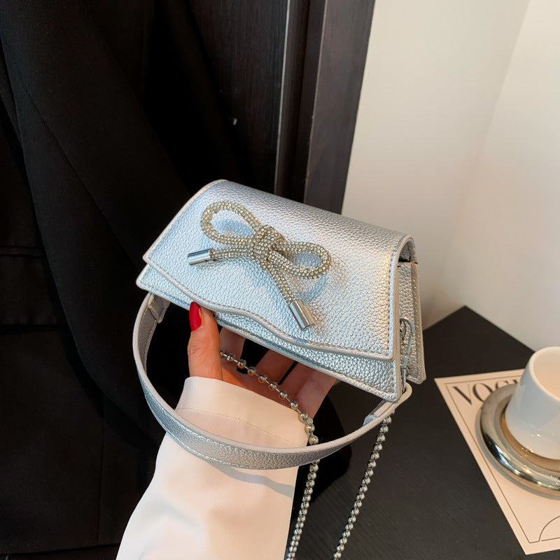 Mini sac à chaîne Aurora avec nœud en strass