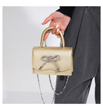 Sheela trendige Handtasche mit Schleife
